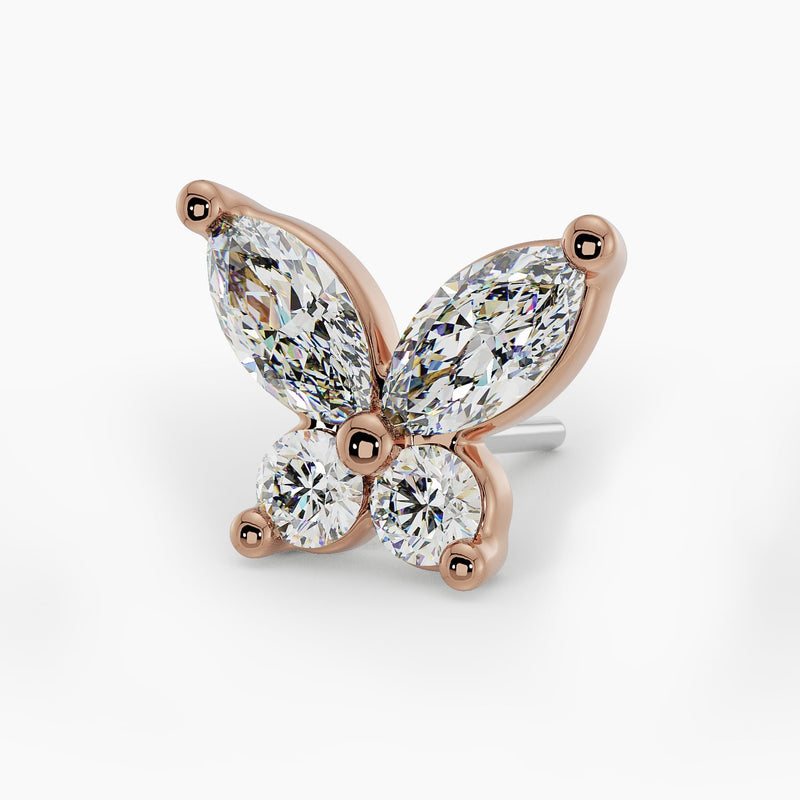 Close-up of 14k rose gold butterfly stud end with marquise upper wings and round diamond lower wings