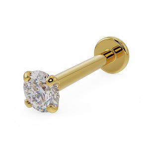 14k yellow gold flat back labret with 2.5mm diamond in low-set martini prong setting, angled view
