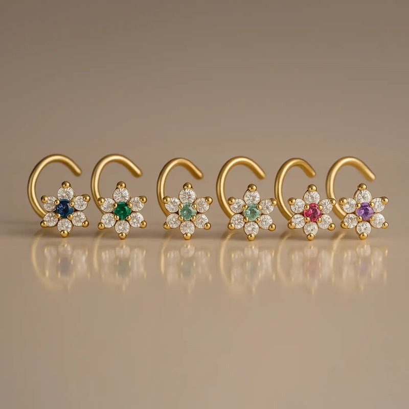 14K yellow gold CZ flower nose ring twist shown in six gemstone color options side by side