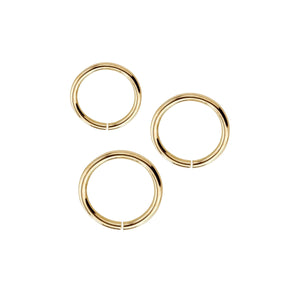 14k yellow gold 20G seam ring set of three showing all sizes: 3/16, 1/4, and 5/16 inch