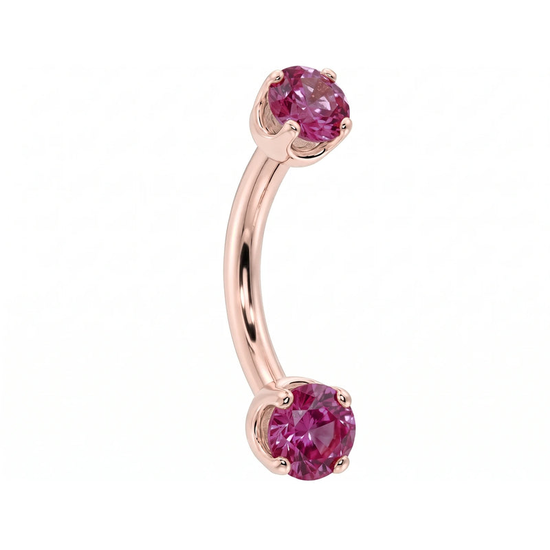Dainty 2mm pink sapphire prong-set curved barbell in 14k rose gold, 18 gauge, angled view