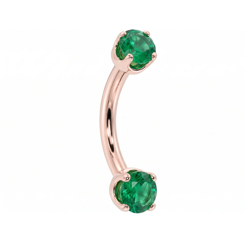 14k rose gold dainty 18G curved barbell with two 2mm round emeralds, angled view