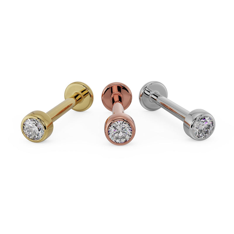 Side-by-side comparison of 2mm CZ bezel flat back labret in yellow gold, rose gold, and white gold