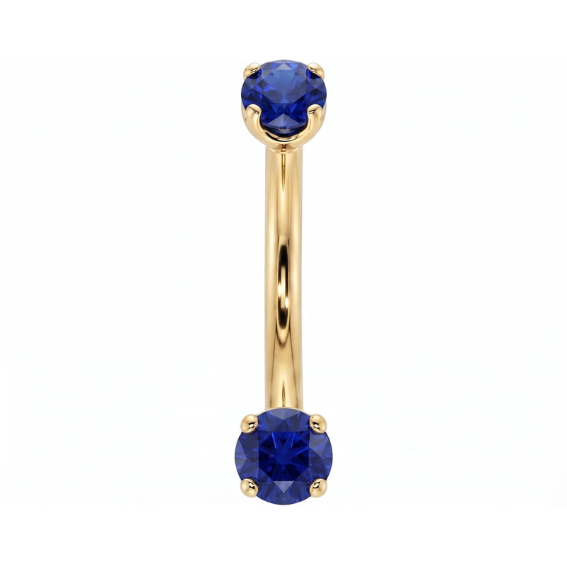 14k yellow gold dainty 18G curved barbell with two 2mm round blue sapphires, front view