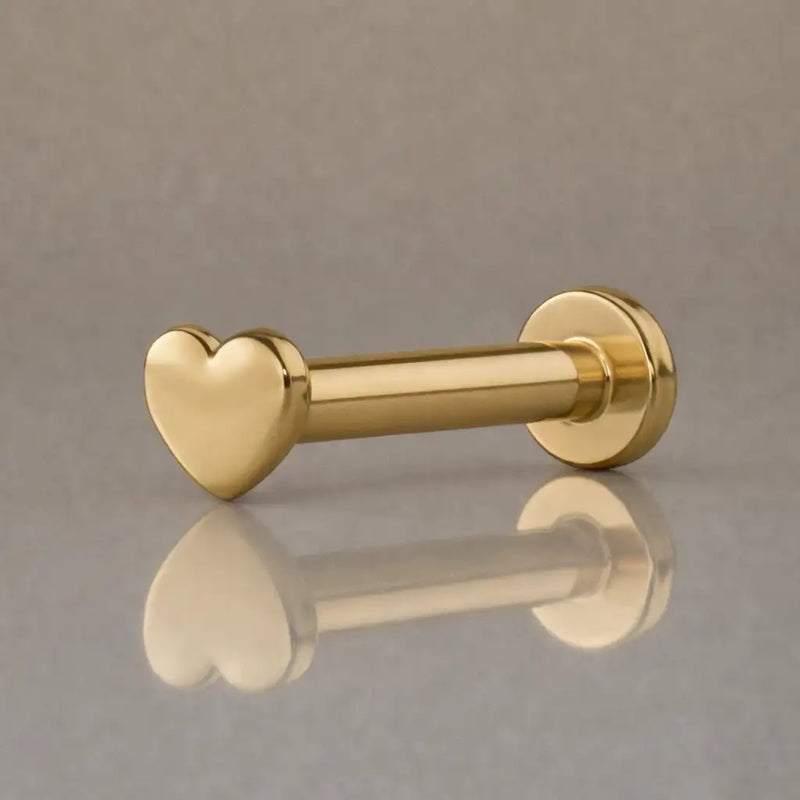 14k yellow gold 2mm heart flat back labret stud, side profile showing post and disc backing