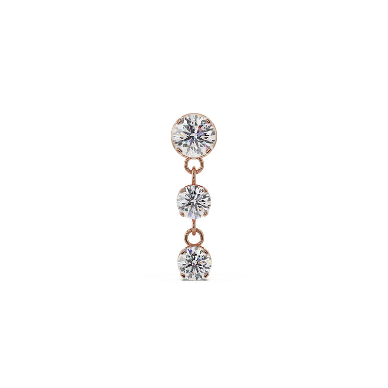 14K rose gold trinity drop labret stud with three cascading prong-set CZ stones, front view