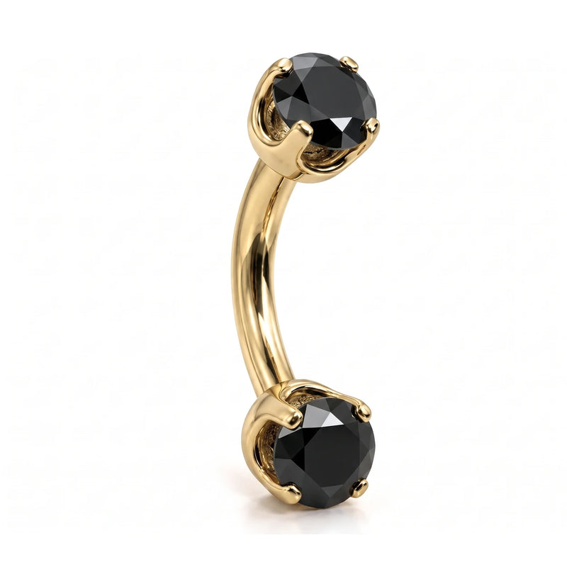 14k yellow gold curved barbell with two 4mm round black diamonds, angled view