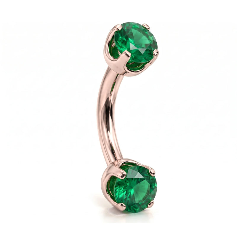14k rose gold curved barbell with two 4mm round emeralds, angled view