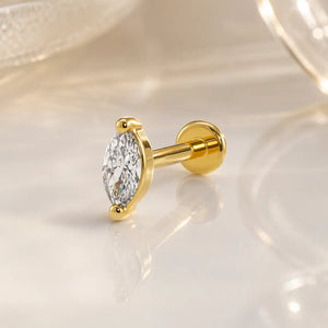 14k yellow gold marquise diamond flat back labret stud with 4-prong setting, angled lifestyle shot