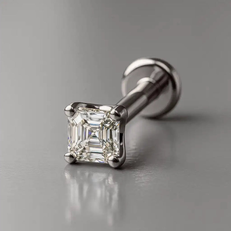 14k white gold Asscher-cut diamond flat back labret stud, angled studio shot showing flat disc base