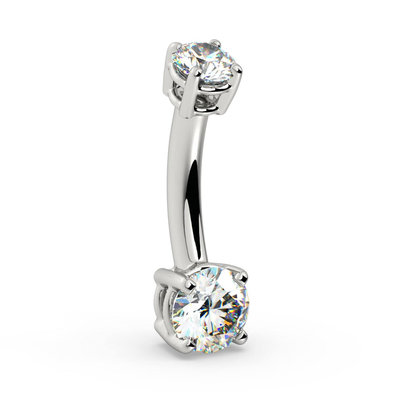 Side profile of 14k white gold diamond belly ring showing curved barbell and prong settings