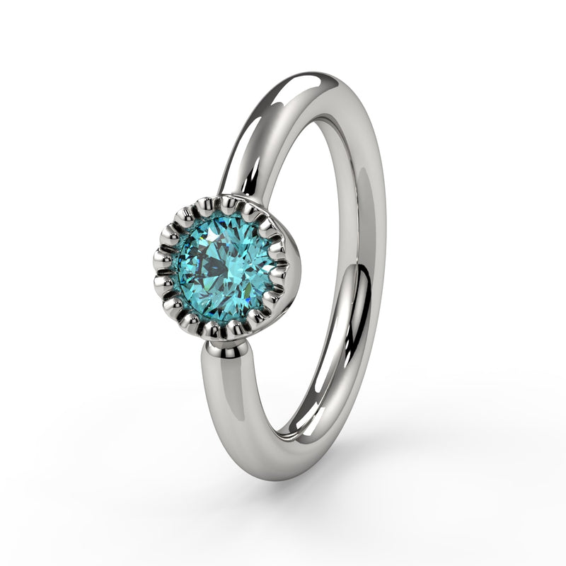 14k white gold aqua diamond Perlagé captive ring, close-up angled view highlighting milgrain setting