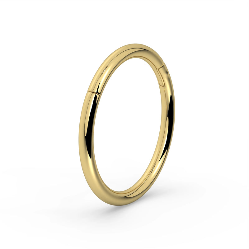 18K yellow gold plain clicker ring hoop, angled three-quarter view showing clicker closure detail