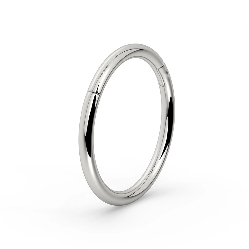 18K white gold plain clicker ring hoop, angled three-quarter view showing high-polish finish