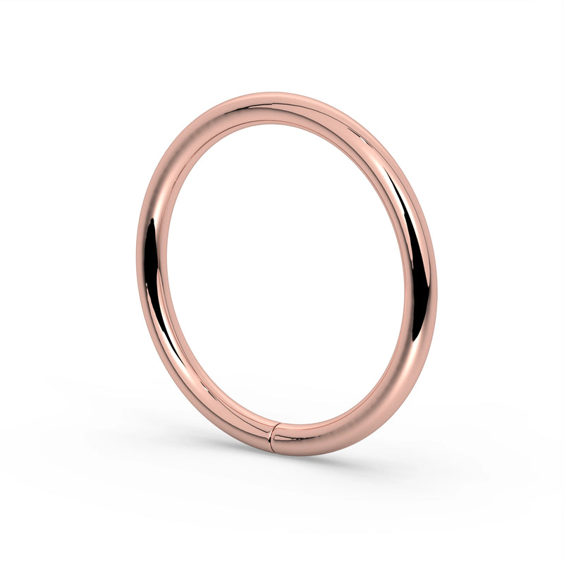 18K rose gold seam ring hoop, angled view highlighting warm pink tone and polished rounded band