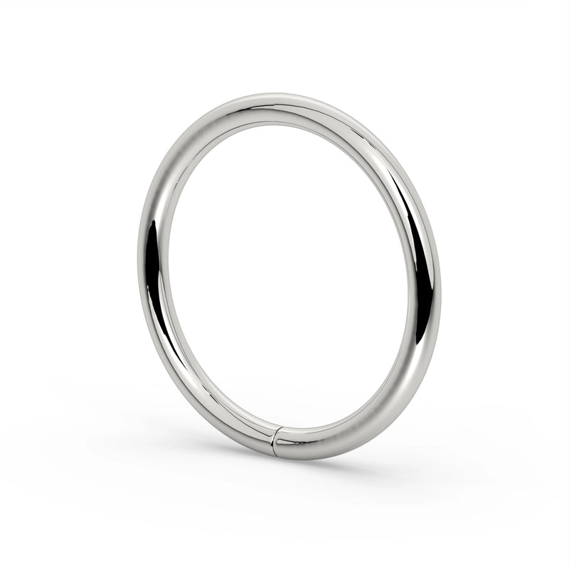 Angled side view of 950 platinum seam ring hoop highlighting mirror-polished finish and profile