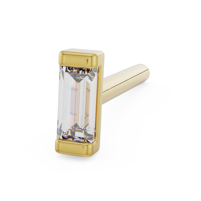 14K yellow gold baguette diamond nose stud bone style, angled view of bezel-set diamond with straight post