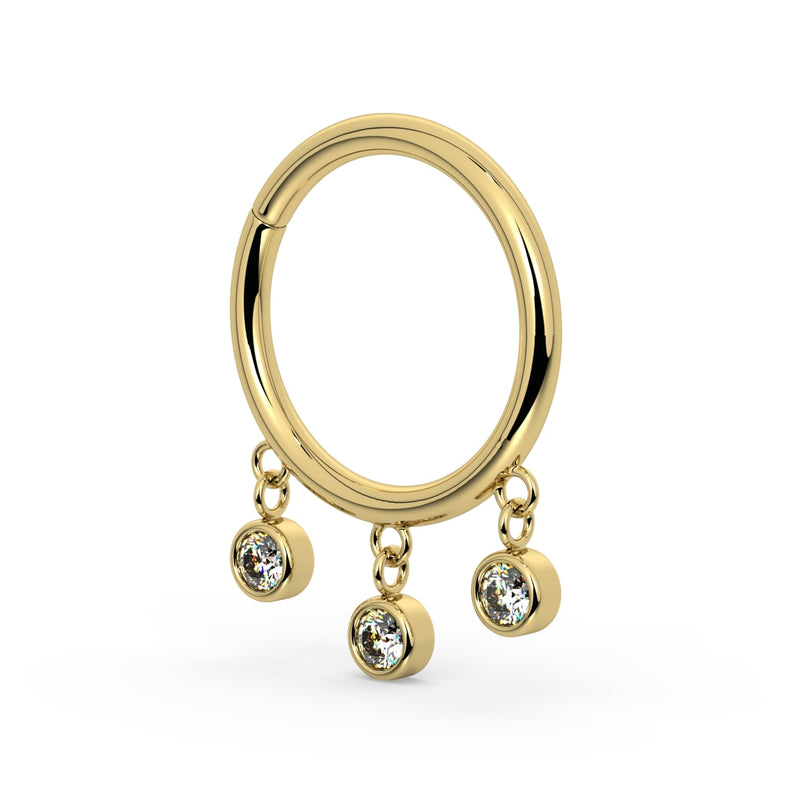 Angled side view of 14k yellow gold triple bezel dangle seam ring showing charm depth