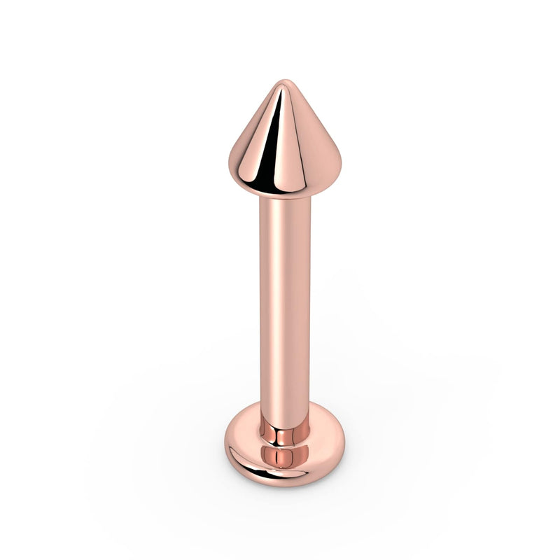 14k rose gold 3mm spike labret stud, front view showing warm pink tone, cone tip, and flat disc base