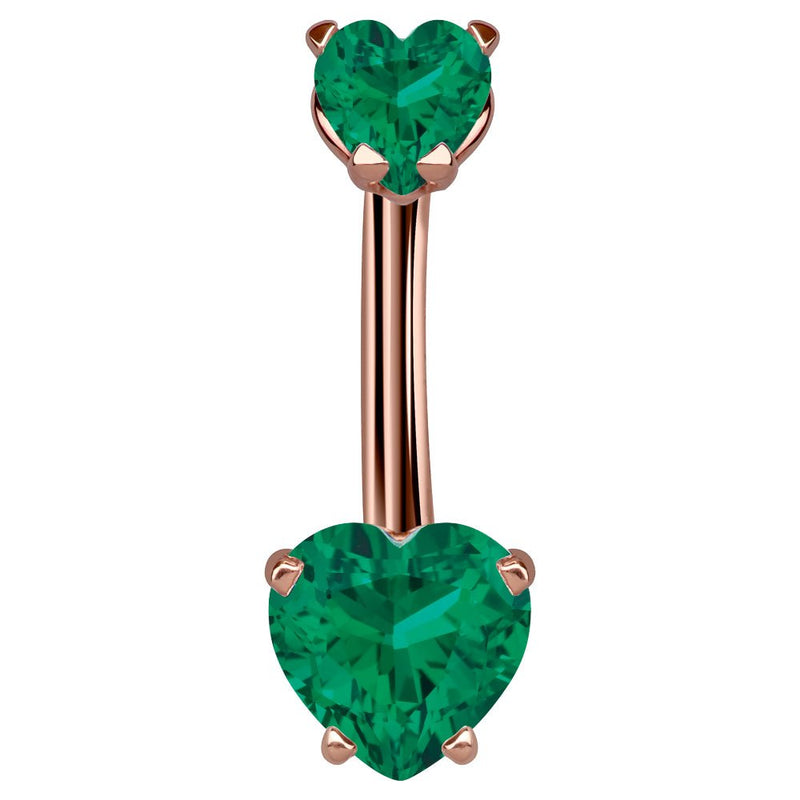 14k rose gold navel ring with dual dark green CZ heart stones in prong settings, front view