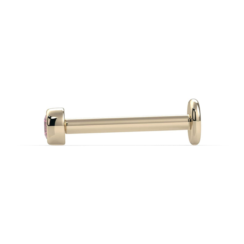Side profile of 14k yellow gold pink diamond bezel labret showing full post length and flat back disc