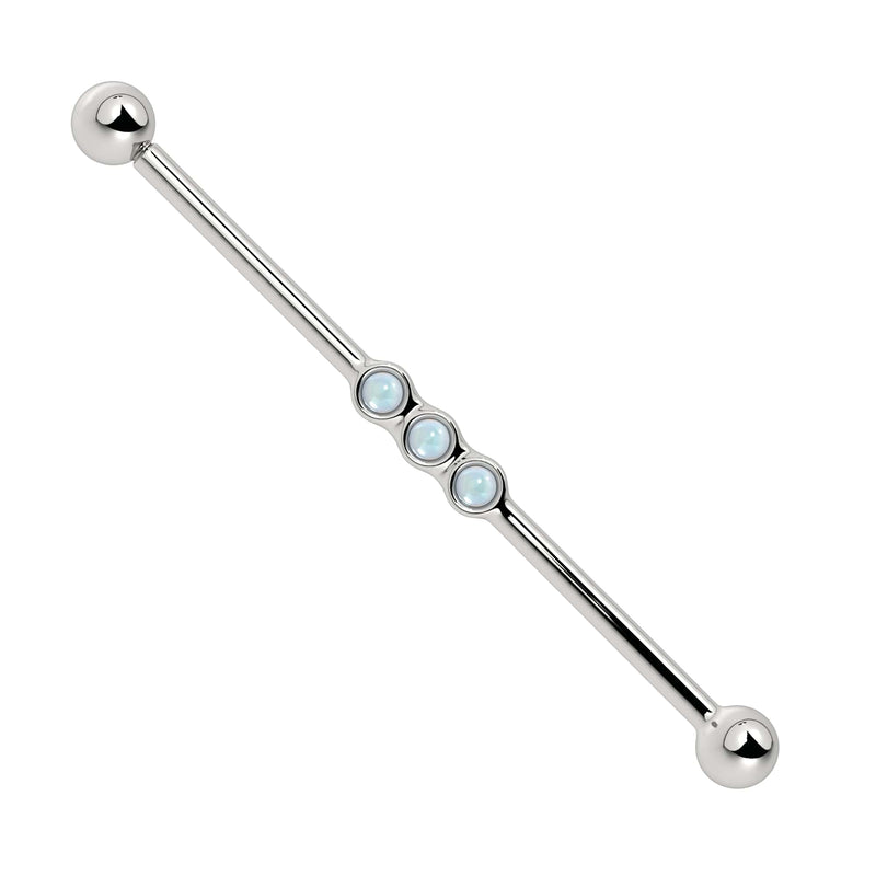 14k white gold industrial barbell with three bezel-set moonstone cabochons in bubble cluster setting