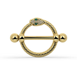 A yellow gold snake nipple shield set with small green and clear stones, shown on a white background.