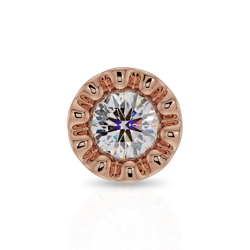Close-up front view of 14k rose gold perlage bezel with round diamond and milgrain border