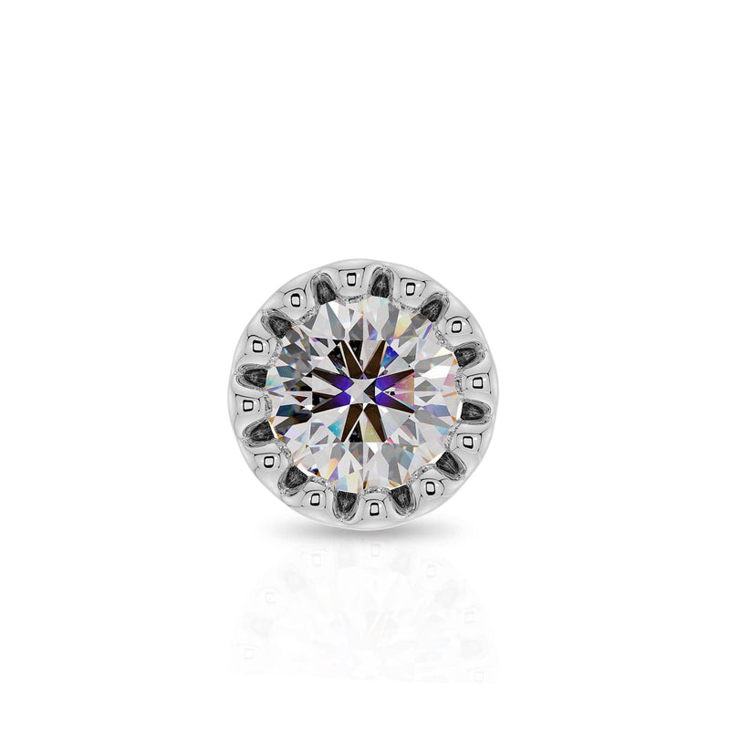 Close-up front view of 1.5mm diamond in white gold perlage bezel milgrain setting