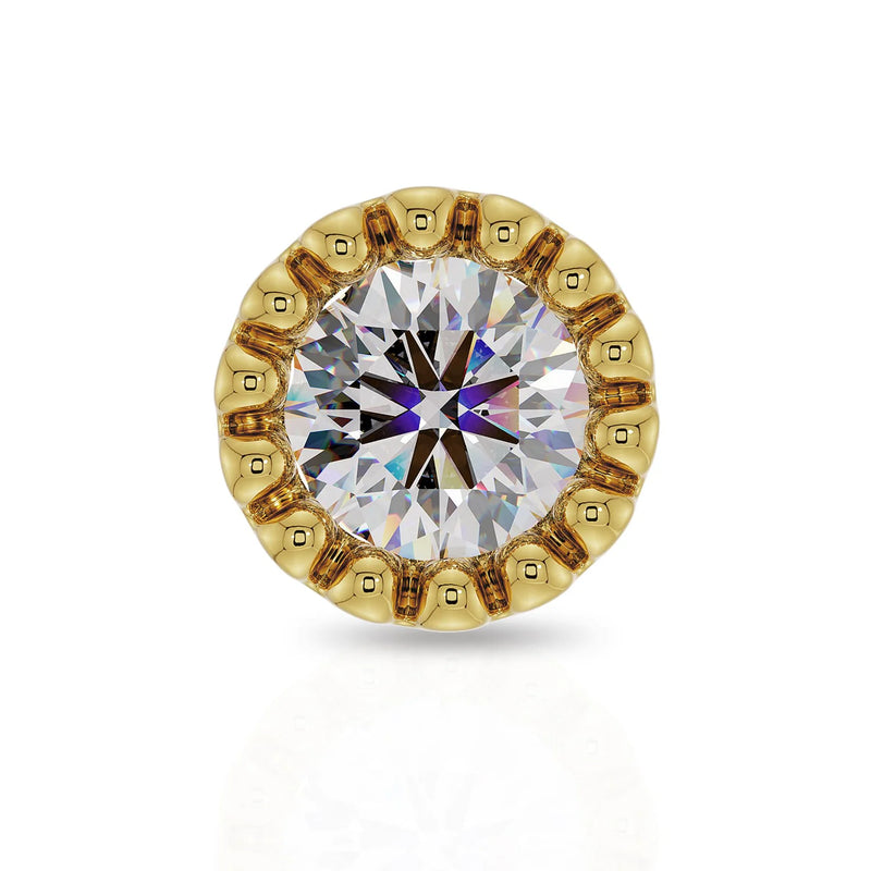 Close-up front view of 2mm diamond in 14k yellow gold perlage bezel setting showing facet brilliance