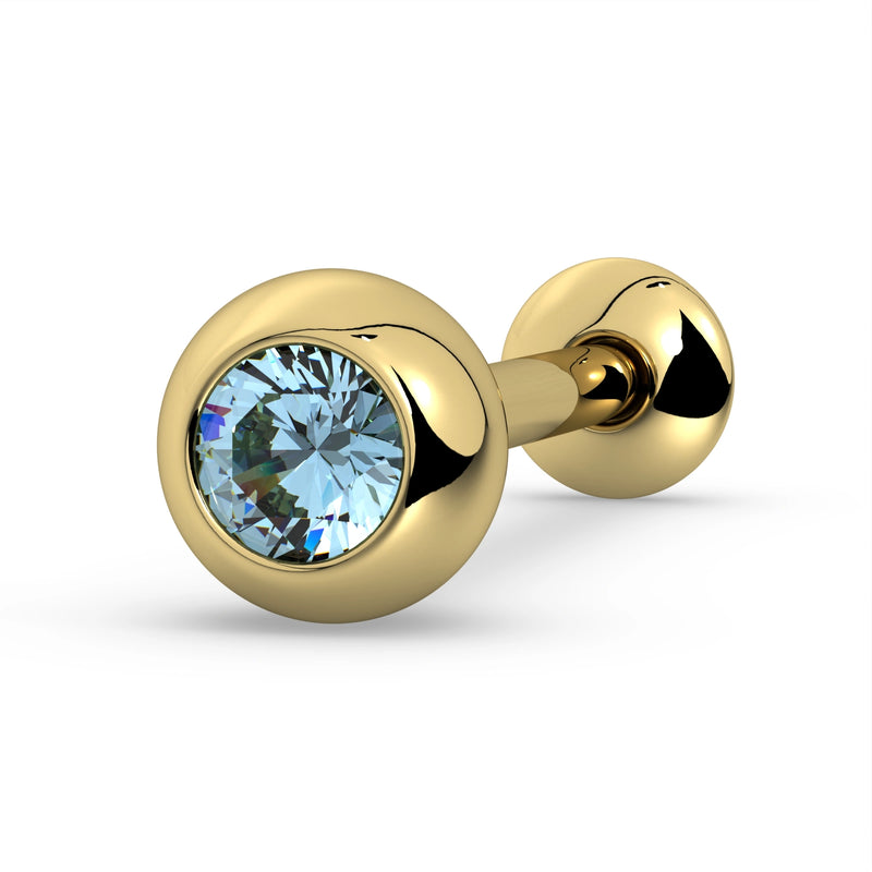 14K yellow gold tongue barbell featuring light blue aquamarine in bezel setting, angled product view