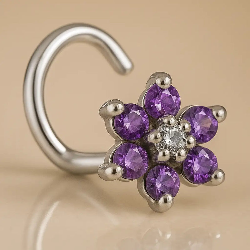 14K white gold flower nose twist with purple CZ petals and clear center stone, angled view