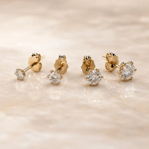 Four Astra Diamond Stud Earrings in various sizes