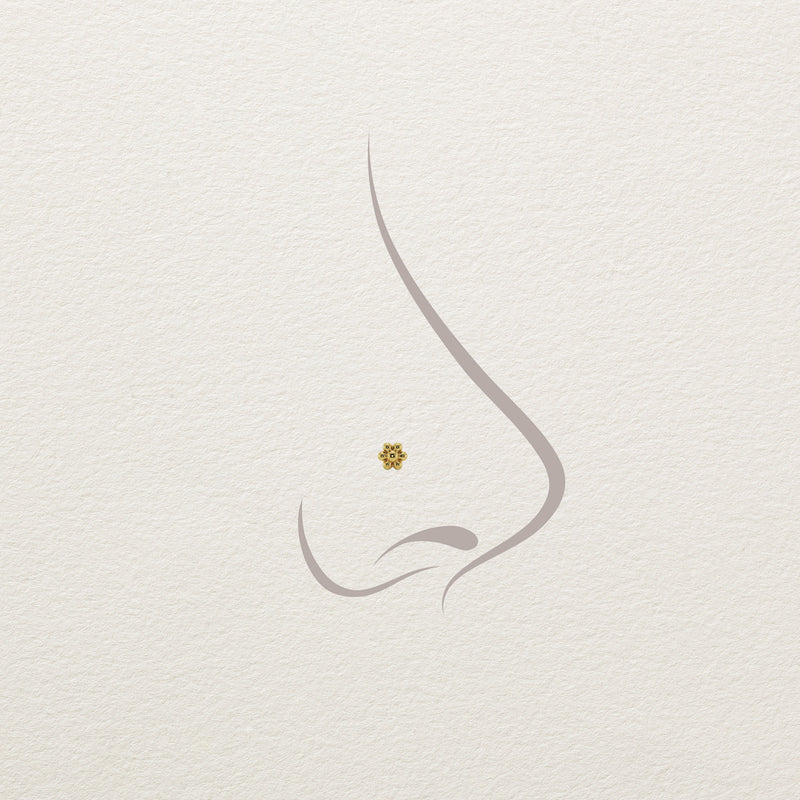 Diagram showing 14k gold flower threadless end worn as a nose stud on illustrated nose profile