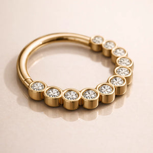 14k yellow gold CZ bubble bezel seam ring, angled lifestyle shot showing bezel setting depth