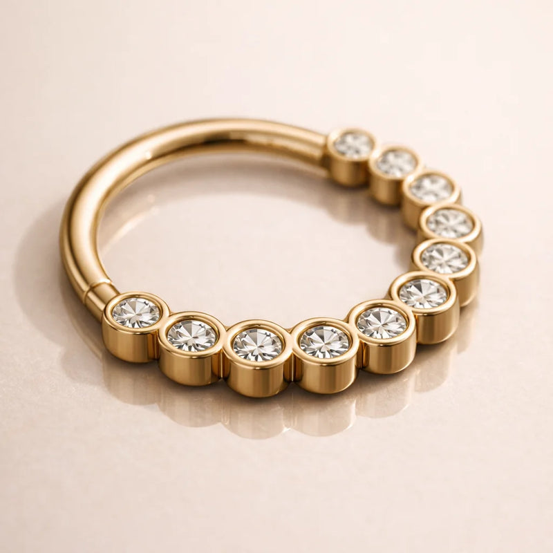 14k yellow gold CZ bubble bezel seam ring, angled lifestyle shot showing bezel setting depth