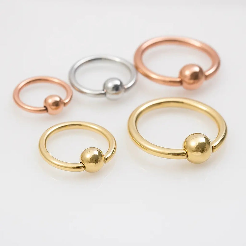 14K gold fixed bead rings in yellow, white, and rose gold across multiple sizes on white background