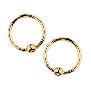 14k yellow gold fixed bead nipple ring set of two, front view on white background