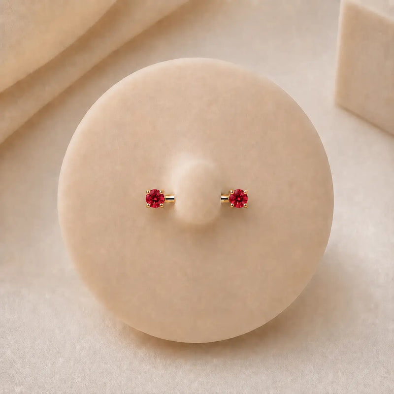 Red gemstone nipple barbell on a model