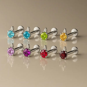 14k white gold diamond accent flat back labrets in eight gemstone color options displayed as a group