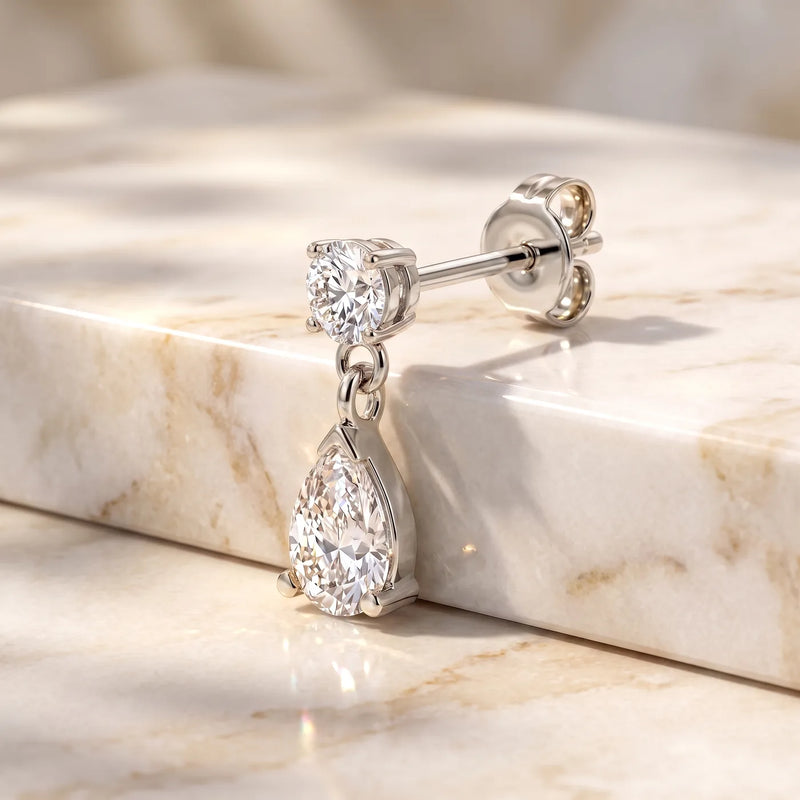 Diamond Pear Drop Stud Earring in 14K white gold, angled view