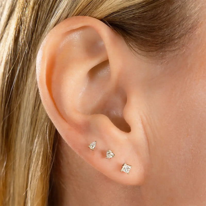 14k yellow gold princess-cut diamond stud in triple lobe stack with pear and round diamond flat back studs