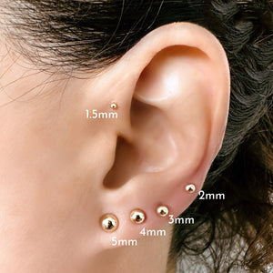 14k gold dome push pin ends shown on pierced ear with size labels 1.5mm through 5mm for scale