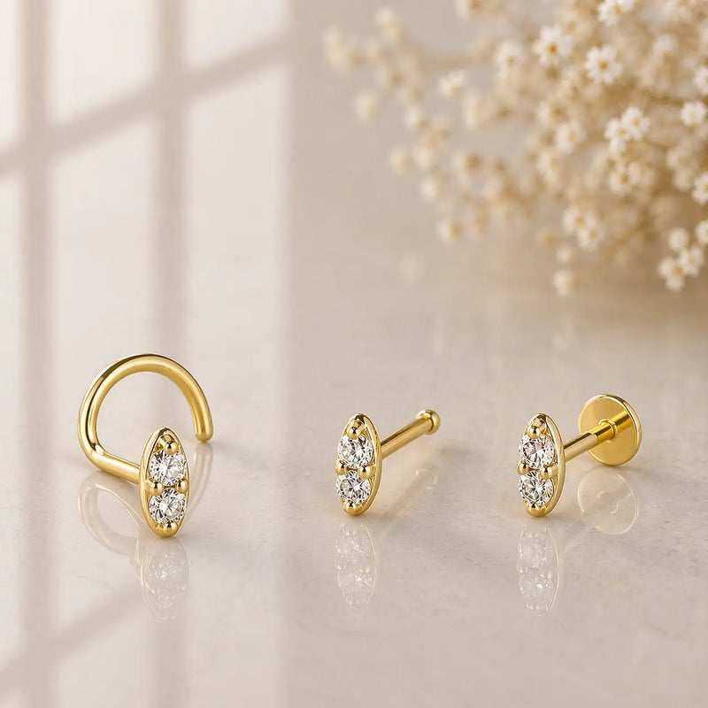 14K yellow gold double diamond nose ring in twist, bone, and straight post styles side by side