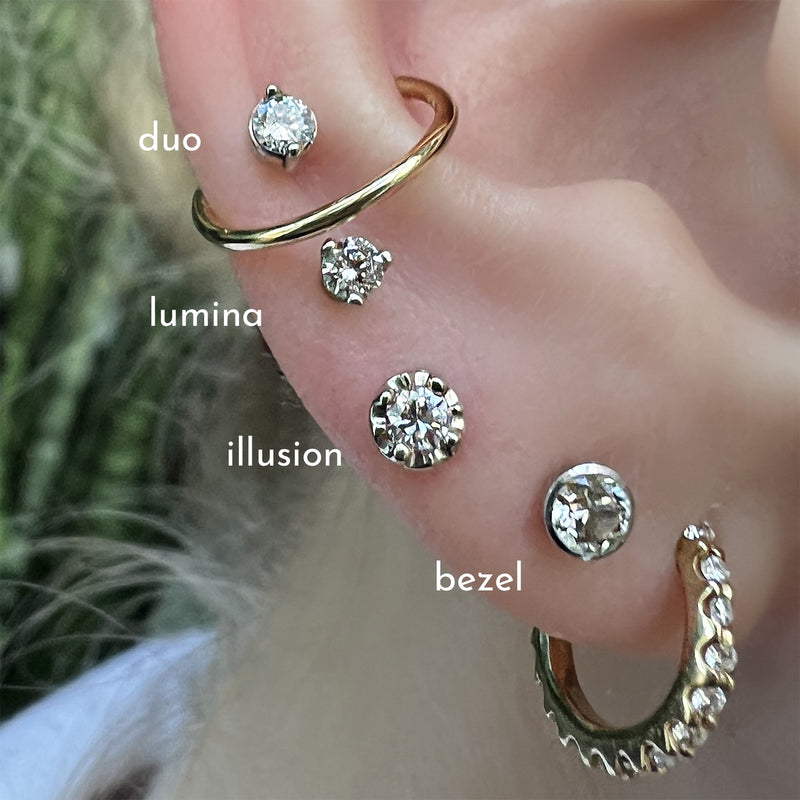 Ear stack comparison showing Lumina 3-prong diamond stud labeled alongside duo, illusion, and bezel styles