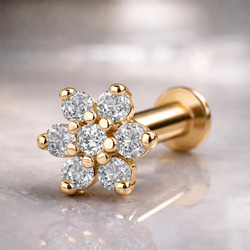 14k yellow gold diamond flower flat back labret with seven prong-set diamonds, angled product view