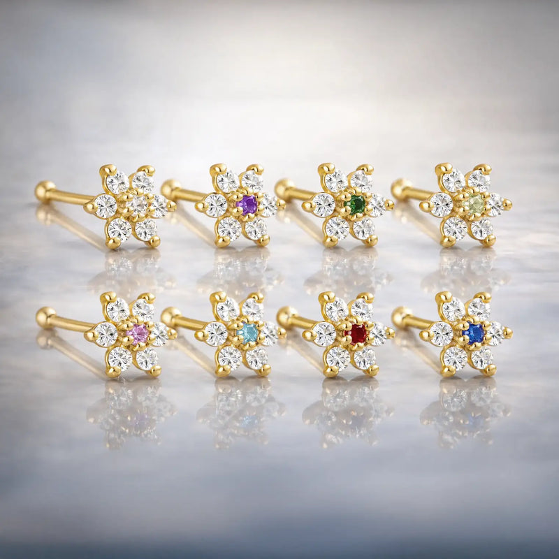 14K yellow gold CZ flower nose bone collection showing all 8 birthstone center color options