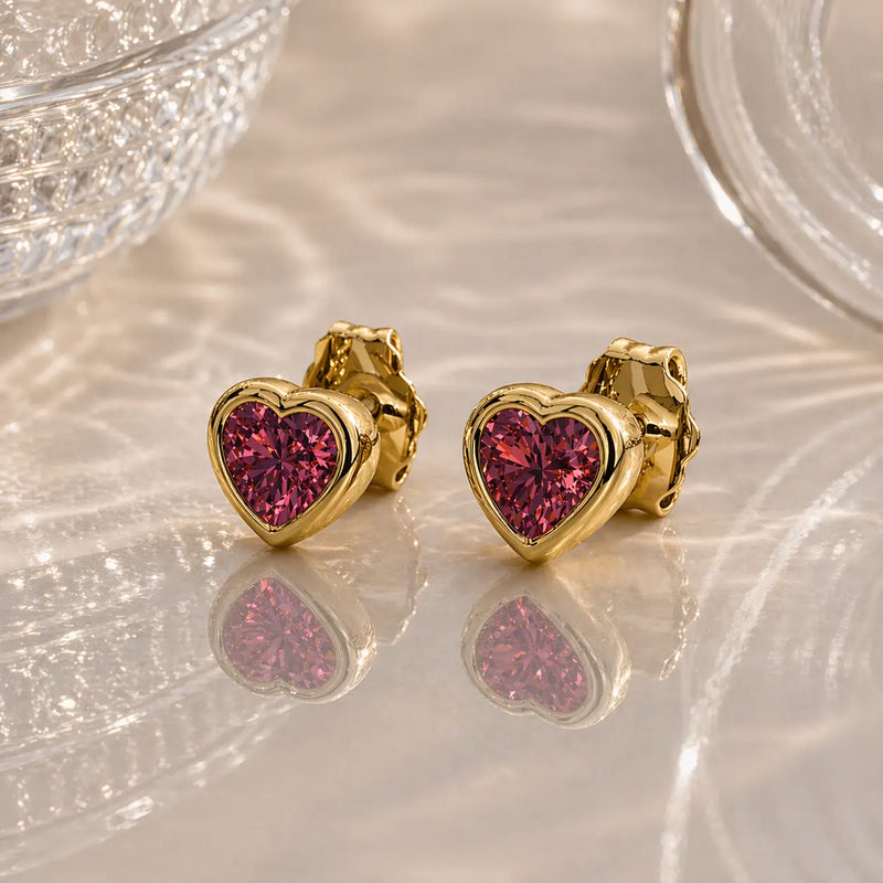 14k yellow gold rhodolite garnet heart stud earrings pair, rich raspberry-red bezel-set gemstones