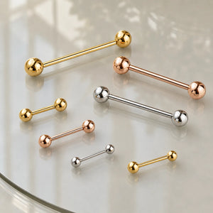 Solid 14k gold straight barbells lifestyle photo