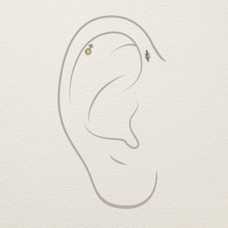 14k gold opal diamond stud end illustrated on helix piercing alongside a marquise ear jewelry companion piece